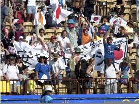 Japanese fans exult in Olympic softball win
